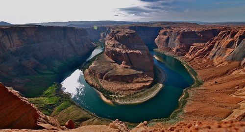Panoramic view of rock formations against sky