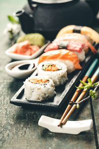 Close-up of sushi served on table