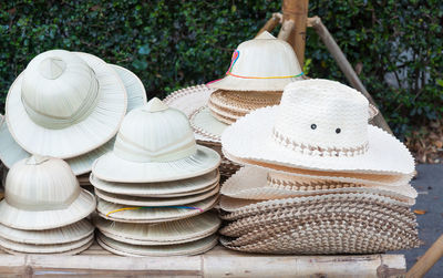 Handmade hats woven from bamboo hats arrangement on market hand craft shop