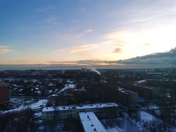 High angle view of buildings against sky during winter