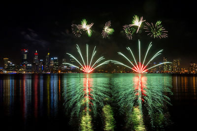 View of firework display at night