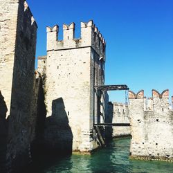 Low angle view of fort upon a lake 