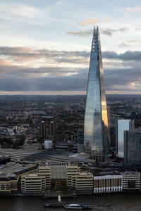 Modern buildings in city against sky
