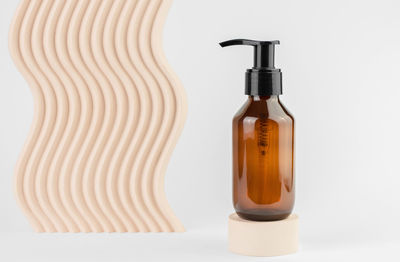 Close-up of bottle against white background