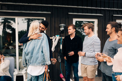Group of people standing in corridor