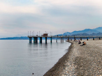 Pier over sea against sky