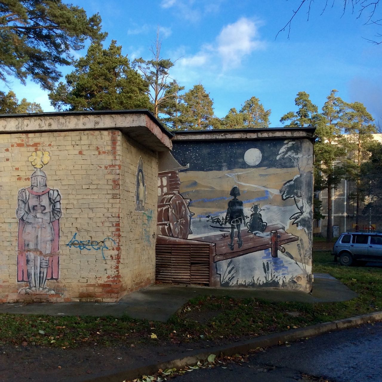 built structure, architecture, building exterior, sky, graffiti, art, art and craft, abandoned, creativity, old, tree, house, damaged, deterioration, day, wall - building feature, weathered, water, obsolete, run-down