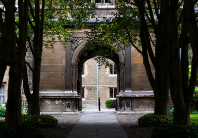 Built structure with trees in foreground