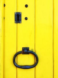 Close-up of yellow door