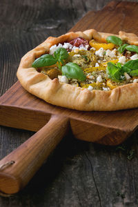 Close-up of pizza on cutting board