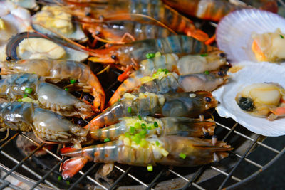 High angle view of seafood on barbecue