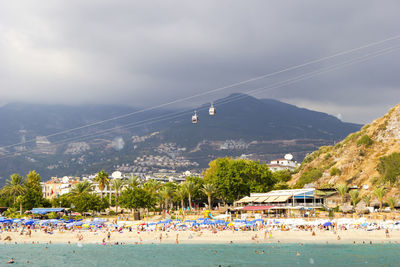 Turkey, alanya, cleopatra beach - august 30, 2017 people on beach, view from the sea.