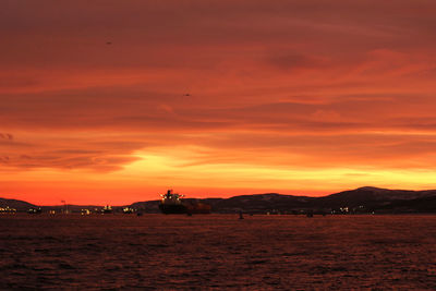 Scenic view of dramatic sky during sunset