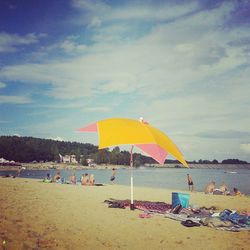 Scenic view of beach against sky