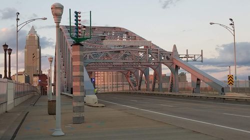 View of bridge and buildings against sky