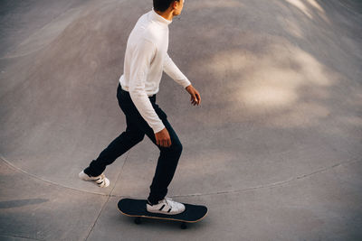 High angle view of man skateboarding at park
