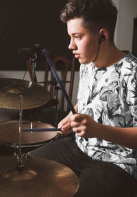 Young man playing piano