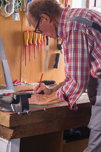Carpenter working at workshop