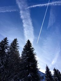 Low angle view of vapor trail against sky