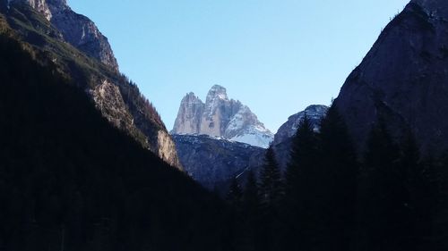 Panoramic view of landscape and mountains against clear blue sky