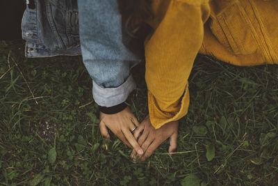 Couple holding hands