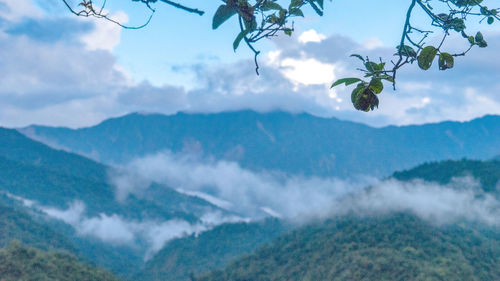 Aerial view of mountains against sky