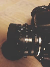 Close-up of camera on table