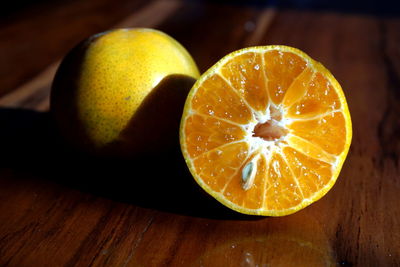 Close-up of oranges on table