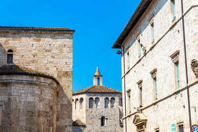 Low angle view of old building against clear sky