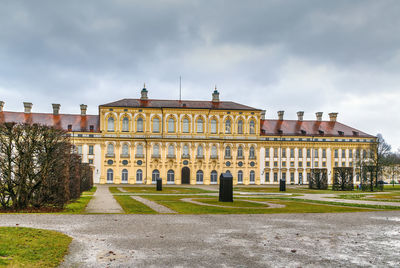 Building against cloudy sky