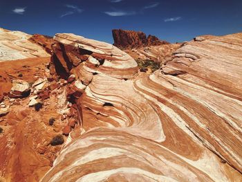 Rock formation on land against sky