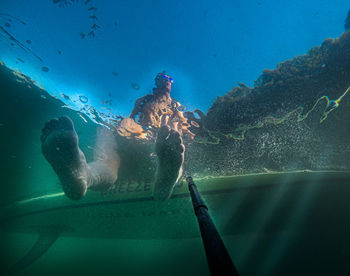 Man swimming in sea