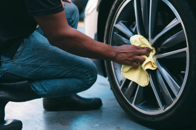 Low section of man working on street