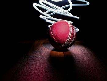 Close-up of object over black background