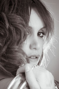 Close-up portrait of a girl drinking