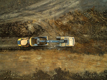 High angle view of abandoned truck on field