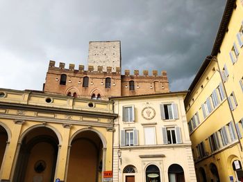 Low angle view of old building against sky