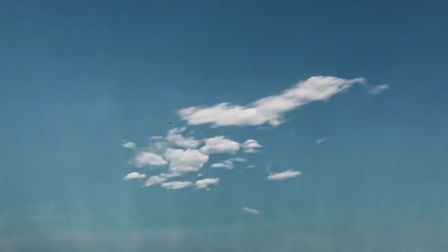 Scenic view of sea against blue sky