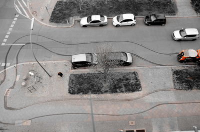 High angle view of cars on wet road