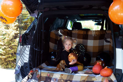High angle view of man sitting in car