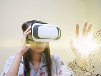 Woman wearing virtual reality glasses 