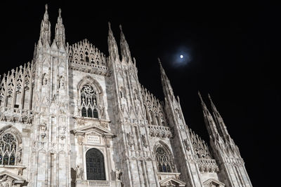 Low angle view of historical building against sky at night