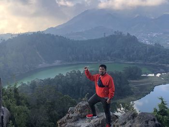 Full length of man on mountains against sky