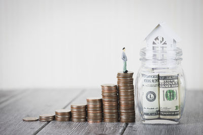 Stack of coin against white background