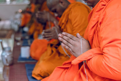 Monks praying in temple