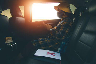 Man sitting in bus