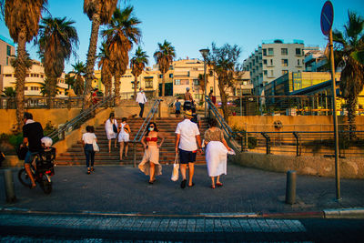 Group of people on street in city