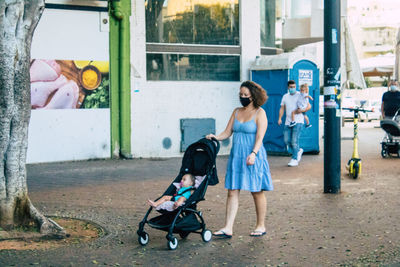 Women walking with umbrella