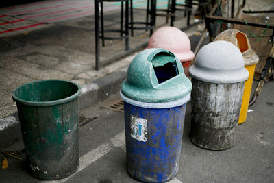 Close-up of garbage bin in row