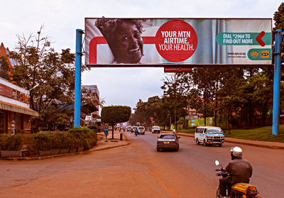 People on road against sky